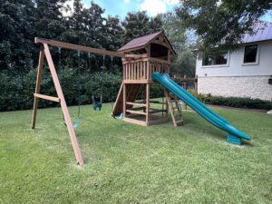 Wood is a durable material for playsets, both reliably strong and fair in price.