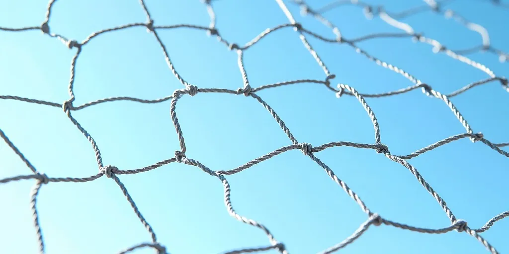 How do you ensure the safety net is taut and free of gaps?
